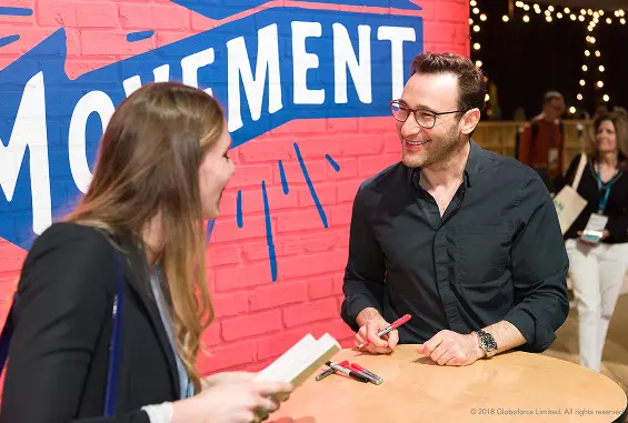 Simon Sinek speaking at an event